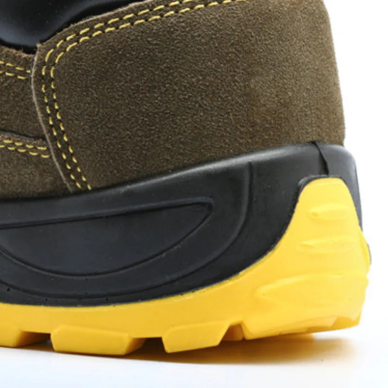 Bronze coloured low-cut cow suede leather safety shoes with a steel toe cap on a patterned non-slip sole.