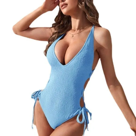 Women’s hollow backless one-piece polyester swimsuit in black, light blue, yellow and green