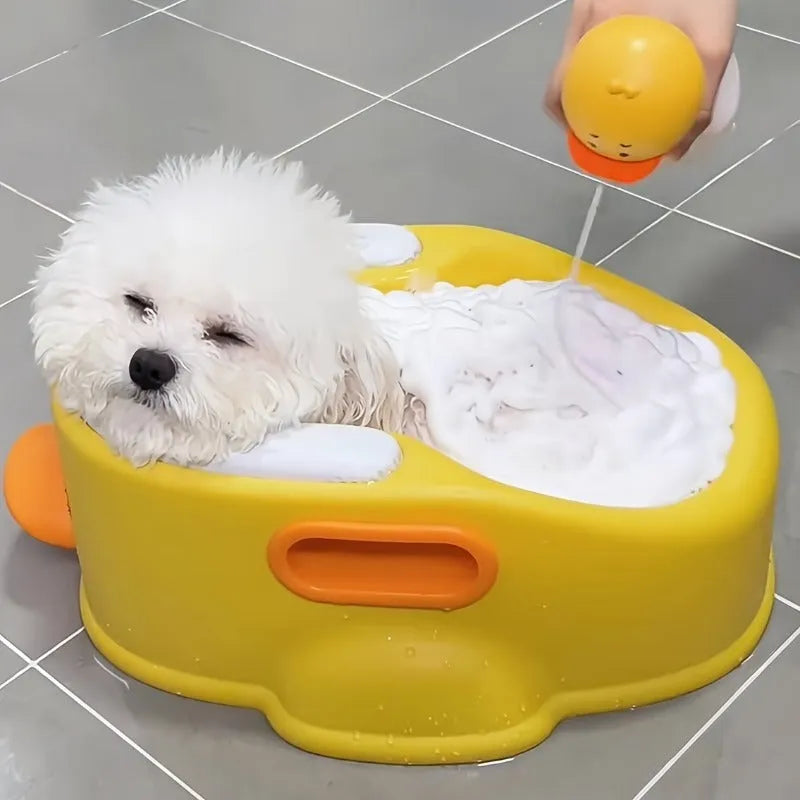Blue PVC pet bathtub shaped like a duck for washing small dogs and cats.