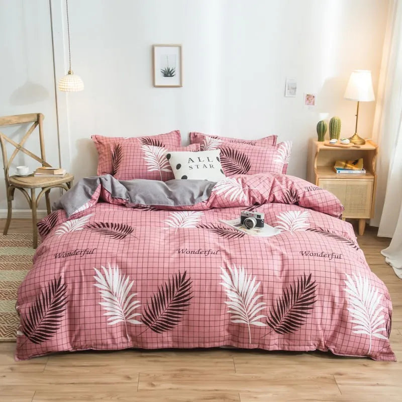 Cotton duvet cover and fitted sheet bedding set in a colour option, shown on a bed