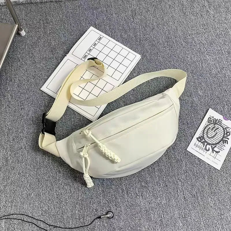 Men's black polyester chest bag shown as a crossbody bag with 35cm width