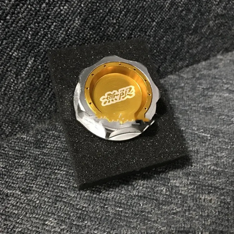 Aluminium alloy oil filter cap for Honda vehicles in assorted colours on a dark background.