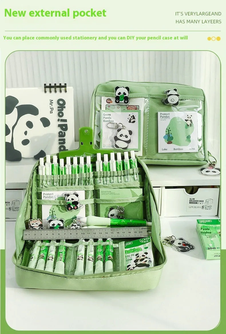 Green Korean-style canvas pencil case showing 12 open layers for organised pen and pencil storage