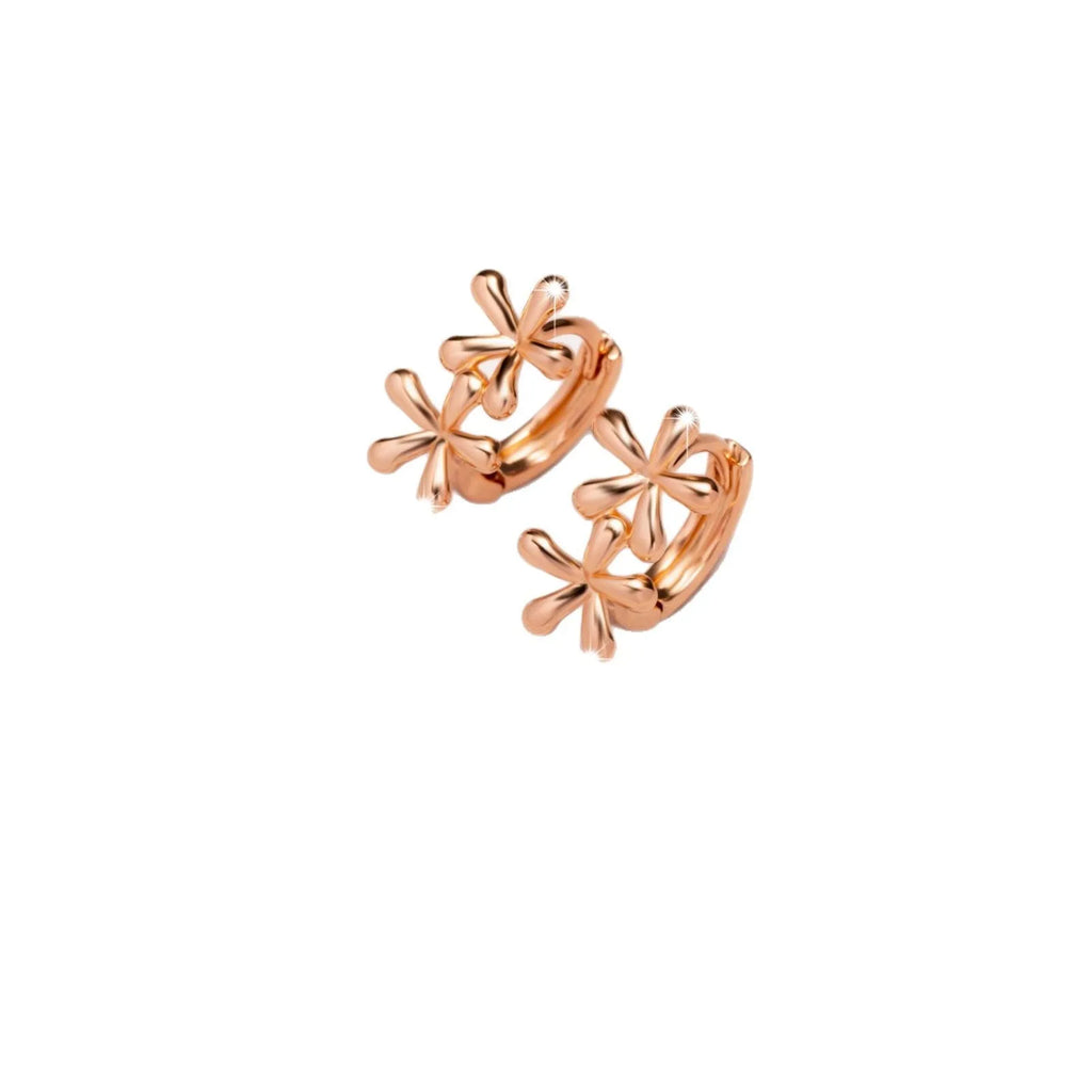 Rose gold circular waterdrop flower earrings with sterling silver posts on a white background.