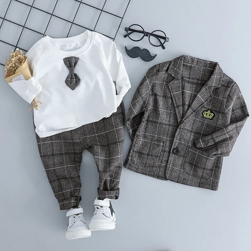 Infant boy's grey three-piece suit with long sleeves on a hanger.