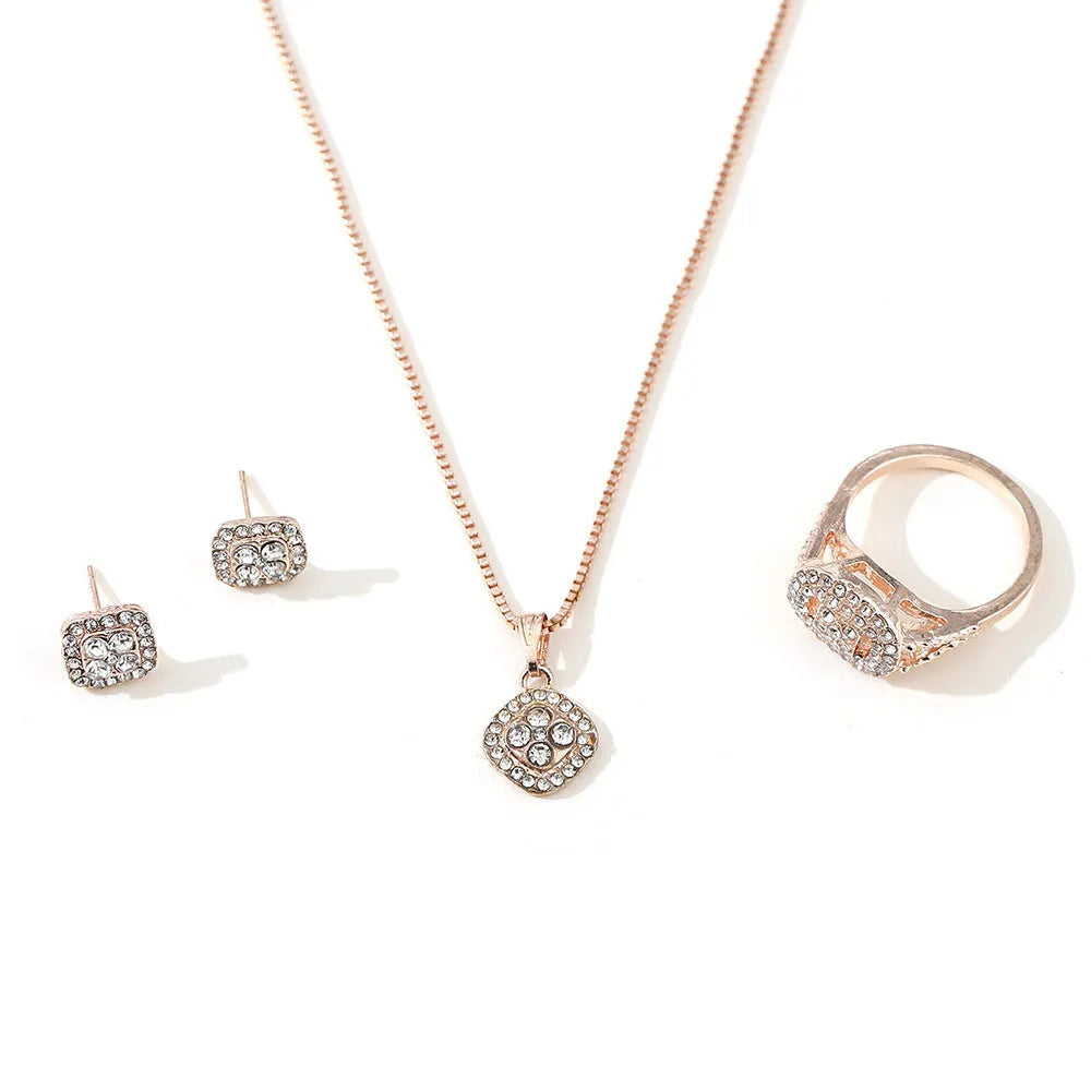 Alloy rhinestone three-piece wedding set with ring, stud earrings and 67cm necklace in gold