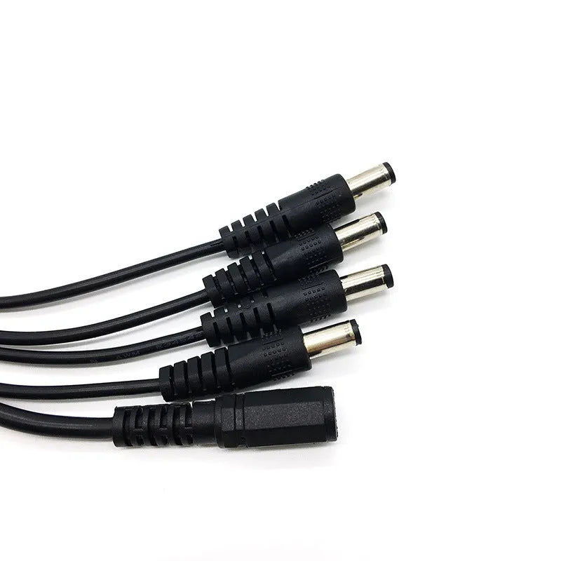 Black DC 1-in-4 power splitter cable with 5.5mm connectors for CCTV cameras