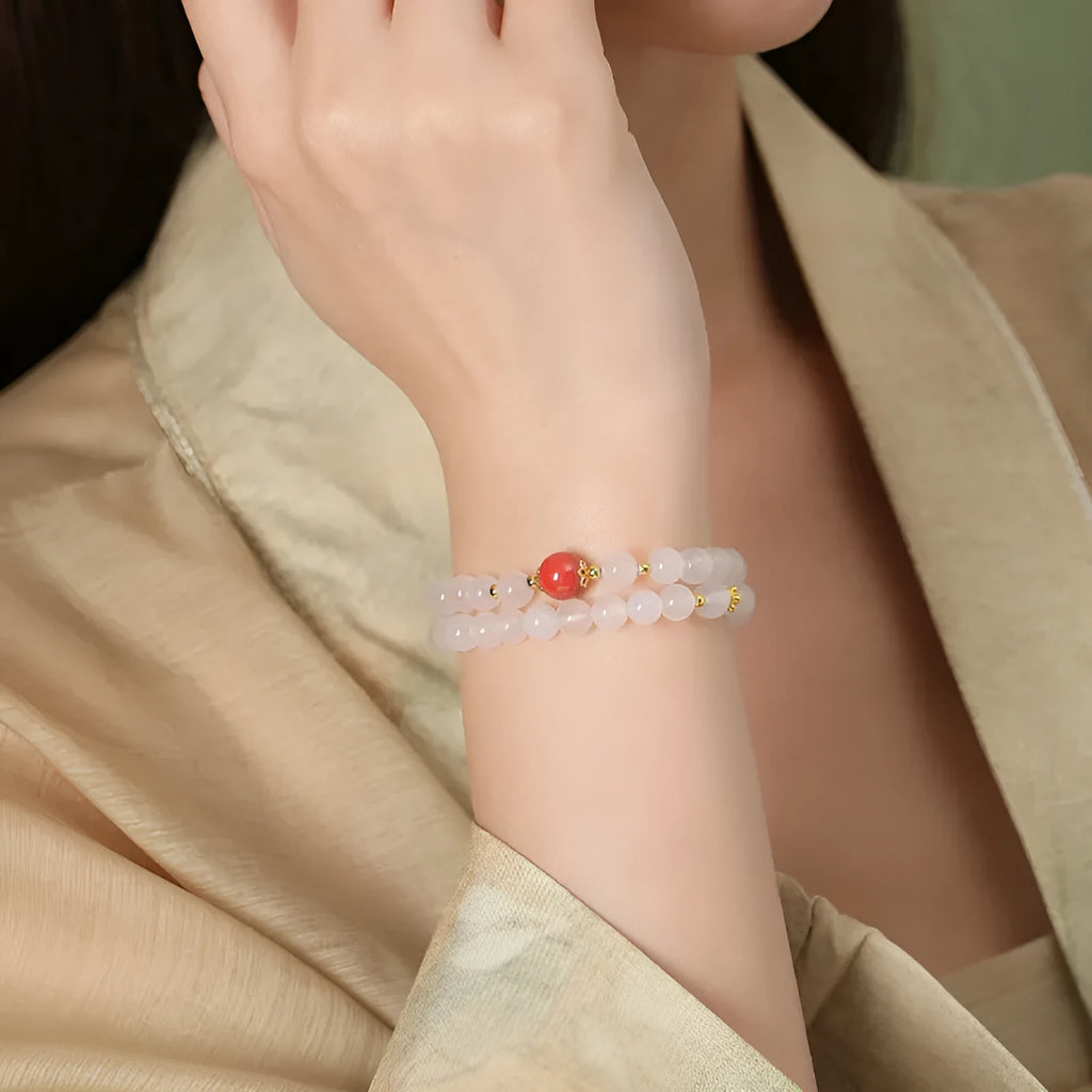 Women's double layer bracelet with white agate geometric beads and Jequirity bean cinnabar accents