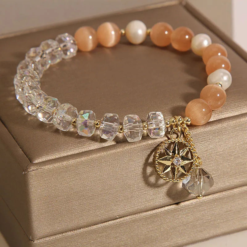 Orange women's bracelet with eight Awn star design featuring opal crystal and artificial gemstone inlay on gold-plated metal