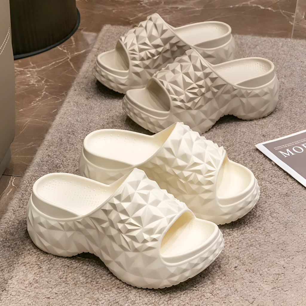 Women's khaki high heel Eva flip flop slippers with a thick sole on a white background.