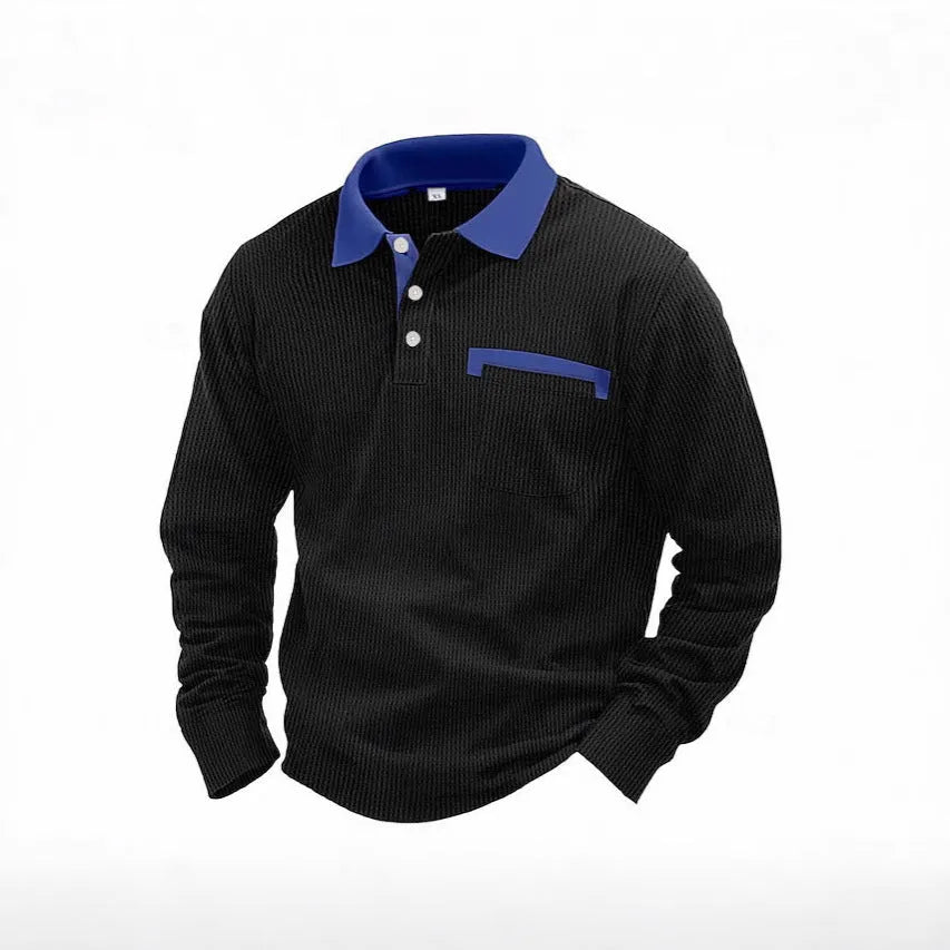 Man wearing a long-sleeved waffle-knit polo shirt in a solid colour with a loose, asymmetric retro fit.