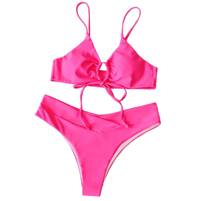 Women's pure colour tied bow split swimsuit bikini on a hanger, showing brief cut.
