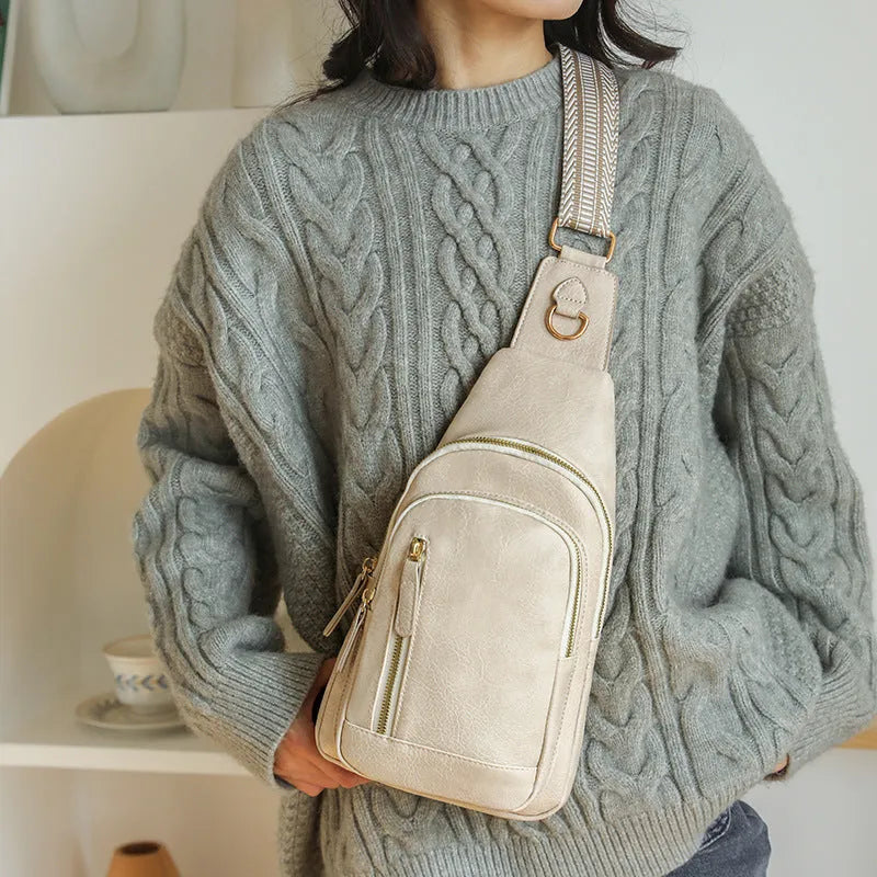 Soft brown women's crossbody chest bag with open pocket and sewing thread detail