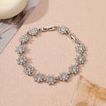 Electroplated zinc alloy flower bracelet with colourful crystal and diamond stones in gold and silver colour finishes