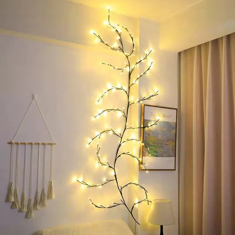 Flexible white birch texture LED vine garland with warm white lights bent into a decorative shape.
