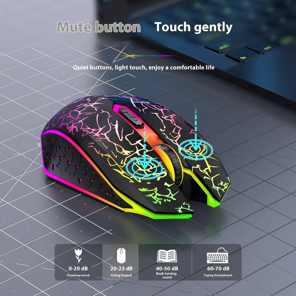 Black and white wireless gaming mouse with RGB lighting on desk with charging cable