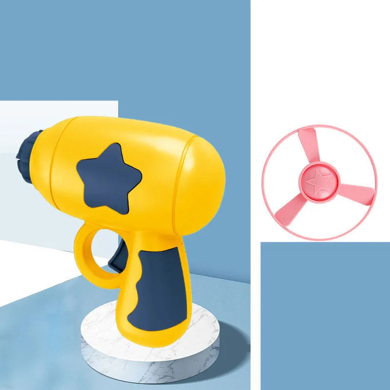 Blue and yellow LED light-up flying saucer launcher toy set with plastic gun and three discs.