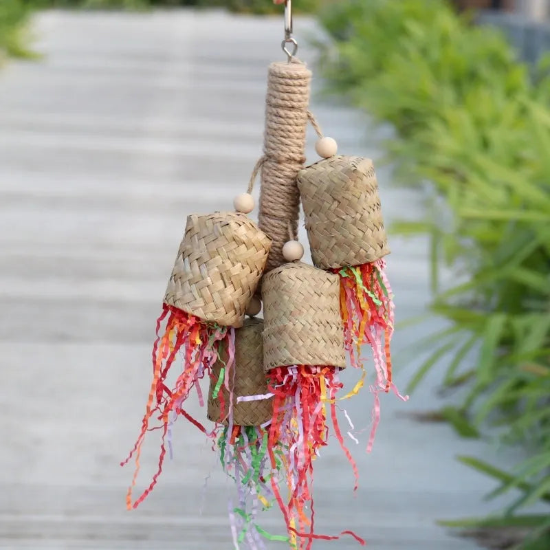 Colourful wooden shredded paper parrot chewing toy with sisal rope hanger