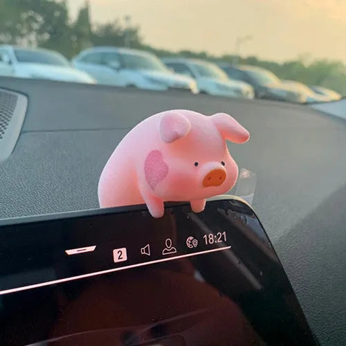 Cute cartoon pig resin figurine car dashboard ornament in one of eight available styles.