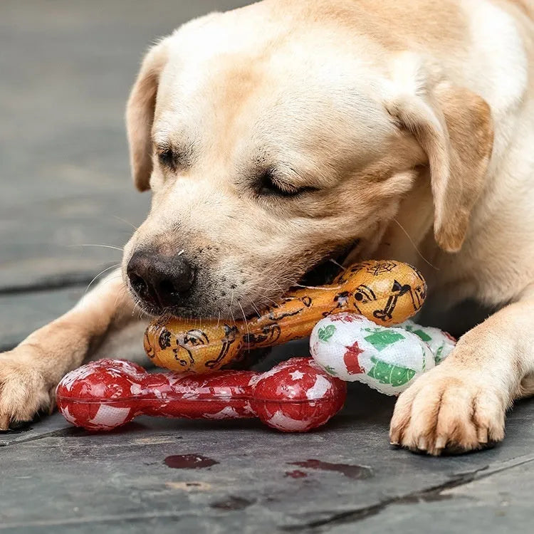 Printed bone-shaped dog toy in red and orange seasonal colours