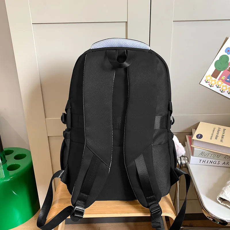 Waterproof nylon high school student backpack in choice of colours, showing pendant and no-pendant styles.