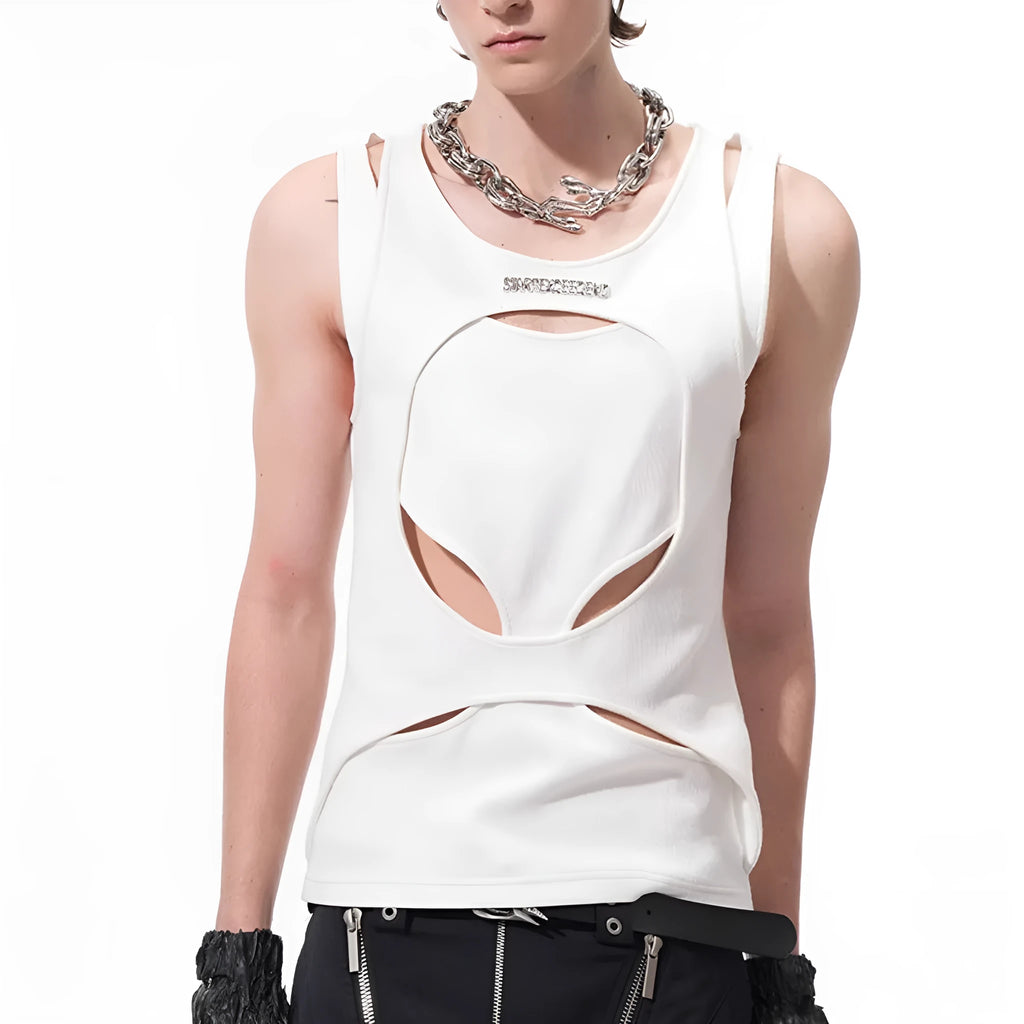 Man wearing a loose-fitting black sleeveless hollow thread waistcoat over a white t-shirt.