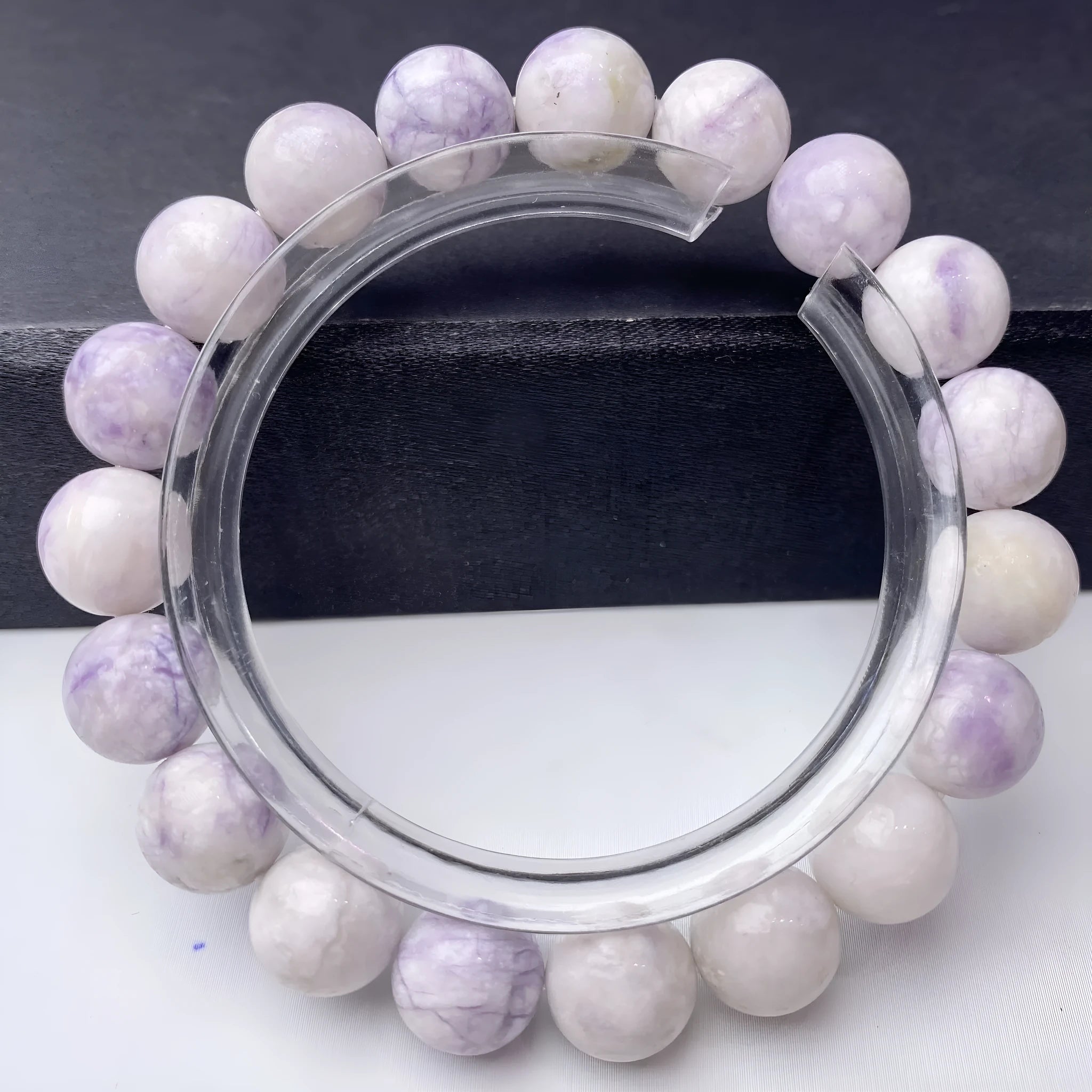 A natural purple turquoise bead bracelet for women, shown in a choice of 6mm, 8mm, or 10mm bead sizes.