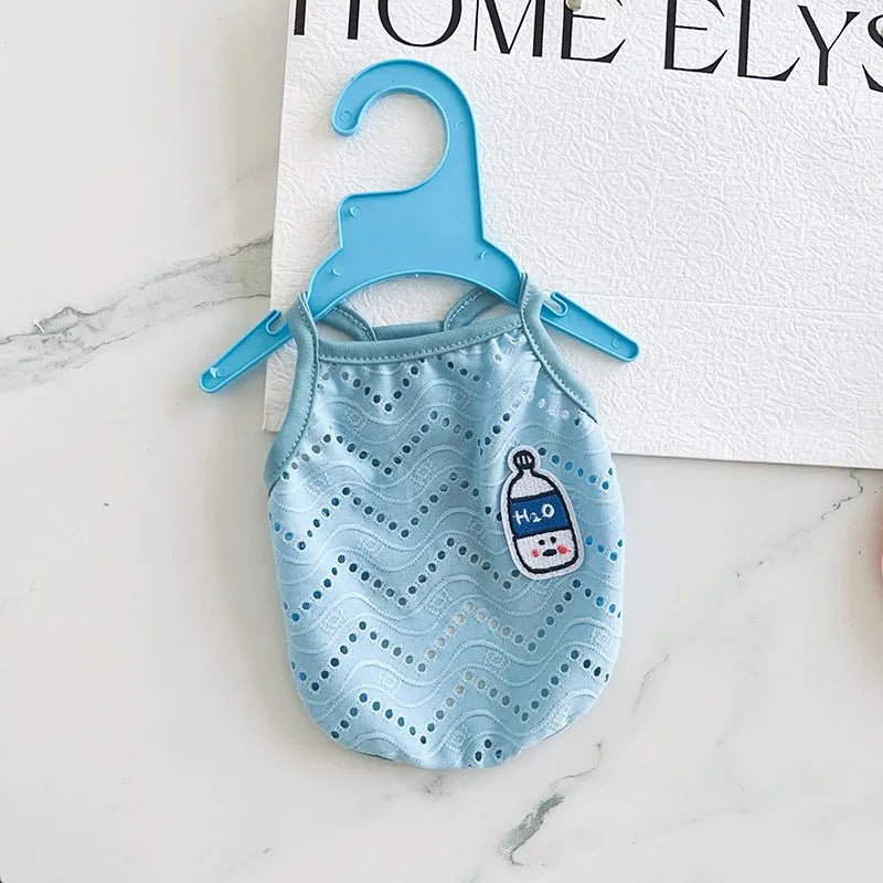 Light blue mesh pet vest for dogs with adjustable straps and breathable fabric