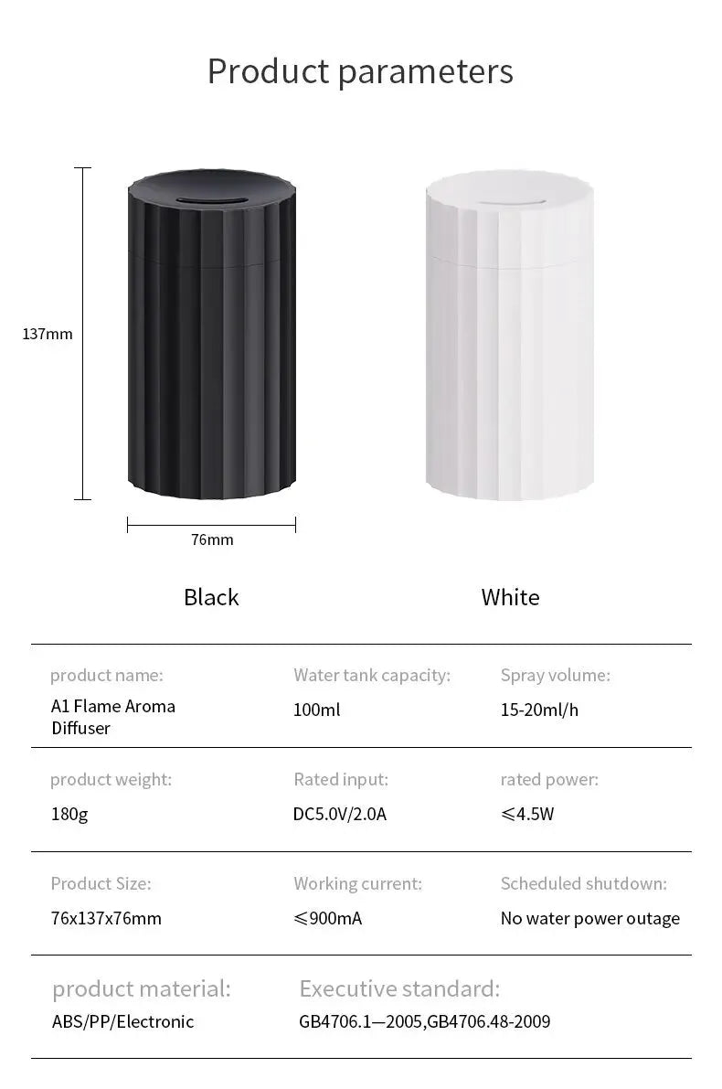 Black portable USB air humidifier and essential oil diffuser with glowing LED flame effect on a table