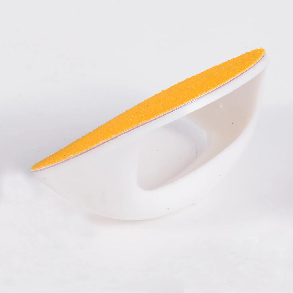 Square dog nail scratch board with ergonomic handle in one of four colours, showing replaceable sandpaper pad.