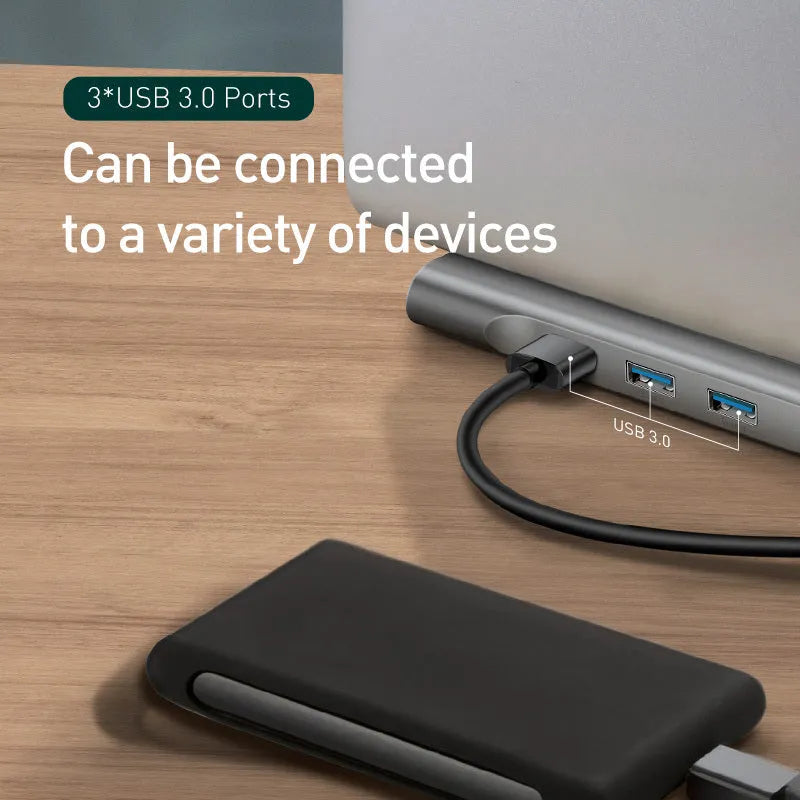Grey aluminium alloy ten-port docking station hub with cooling bracket showing HDMI, VGA and USB ports