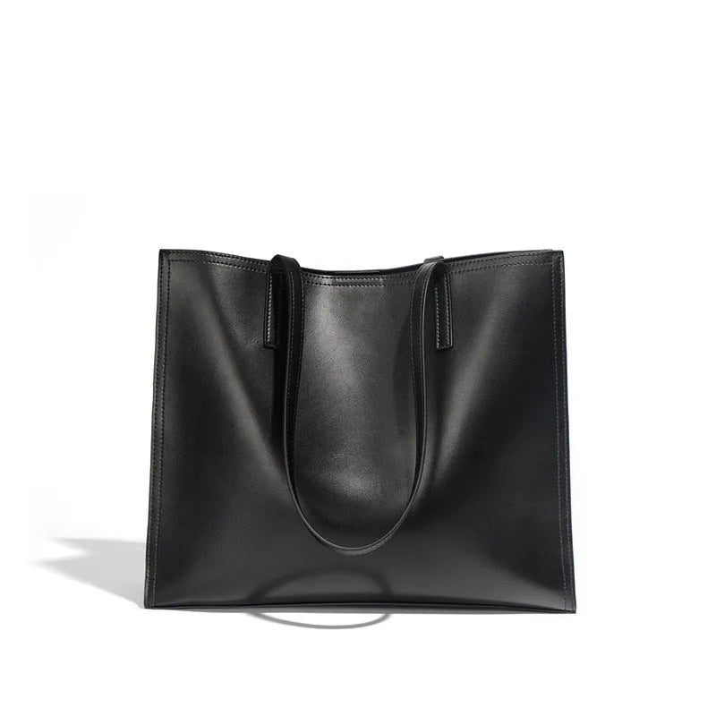 Women's brown genuine leather one shoulder handbag with multiple interior compartments
