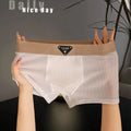 Men's ice silk sport boxer in nylon, mid waist cut, available in multiple colours including black and white