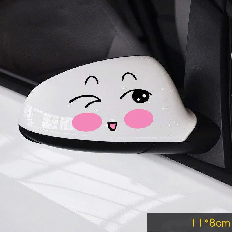 A pair of reflective cartoon eye car stickers made from PET vinyl, designed for vehicle body or rearview mirror.