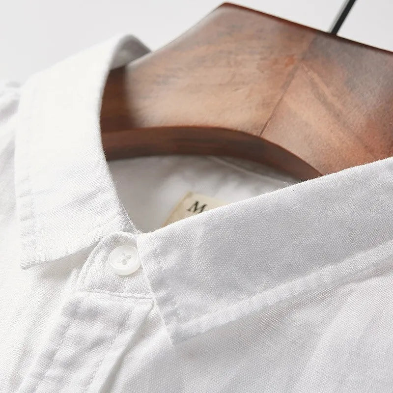 Men's loose fit short sleeve casual shirt in cotton blend fabric with a square collar.