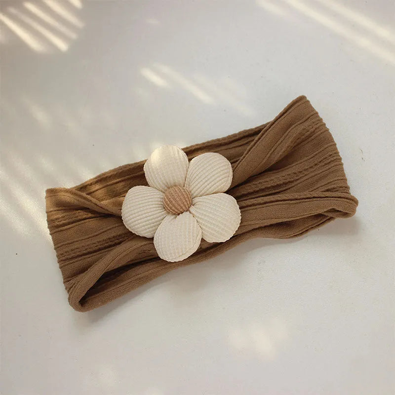 Soft nylon baby flower headbands for newborns, toddlers, in beige, pink, khaki, brown, white colours