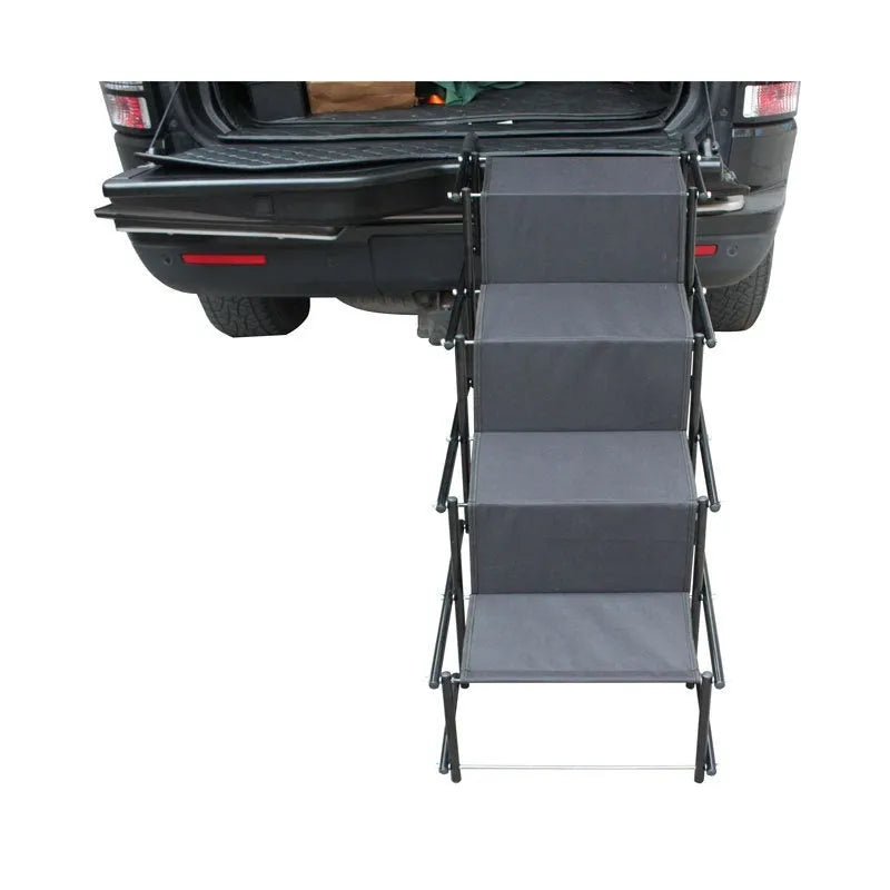 Folding stainless steel dog ladder ramp in navy blue, shown extended next to a car.