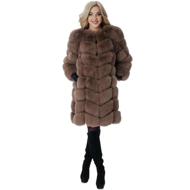 Women's long artificial fur coat in dark camel colour with regular sleeves.
