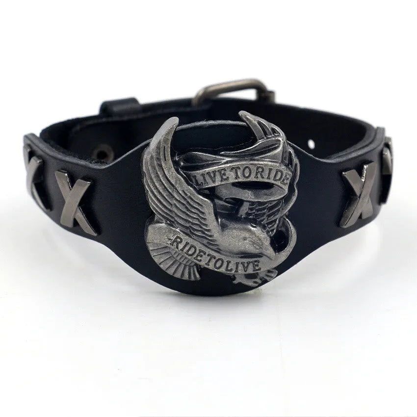Black leather geometric bracelet with alloy eagle watch-buttom closure on wrist