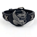 Black leather geometric bracelet with alloy eagle watch-buttom closure on wrist