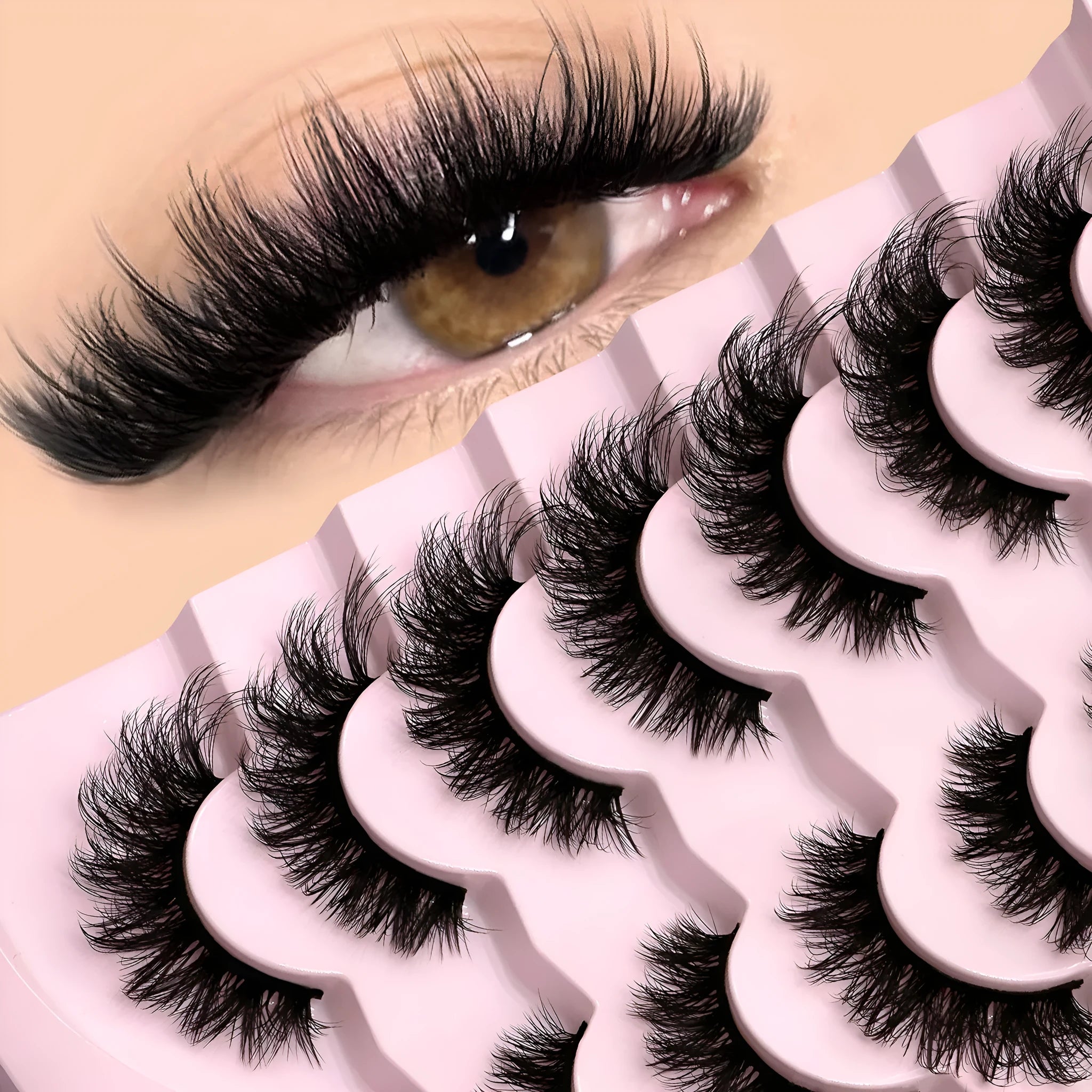 Box of black artificial fibre false eyelashes in a natural thick style with a tube of adhesive glue.
