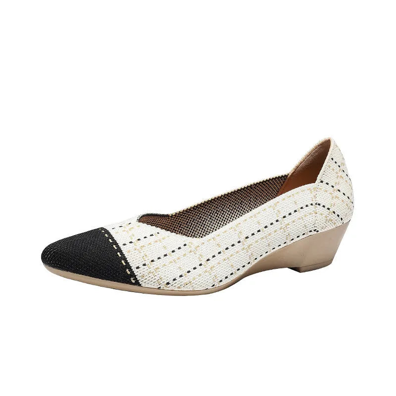 Women's casual Flyknit wedge shoes with a mid heel and rubber sole in various colours.