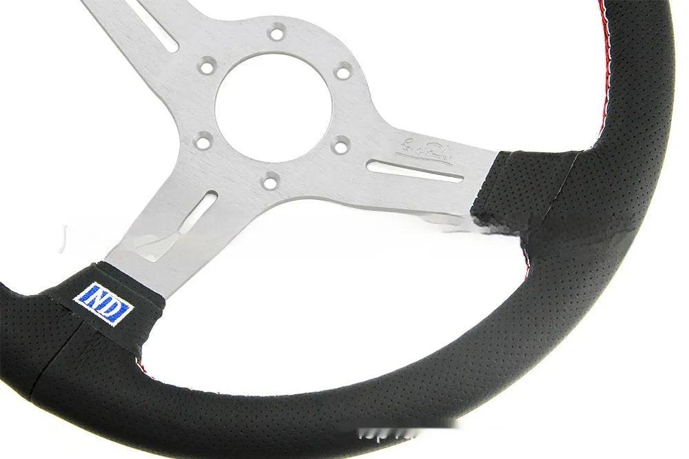 Leather-wrapped 14-inch steering wheel with concave sides on a black metal skeleton frame