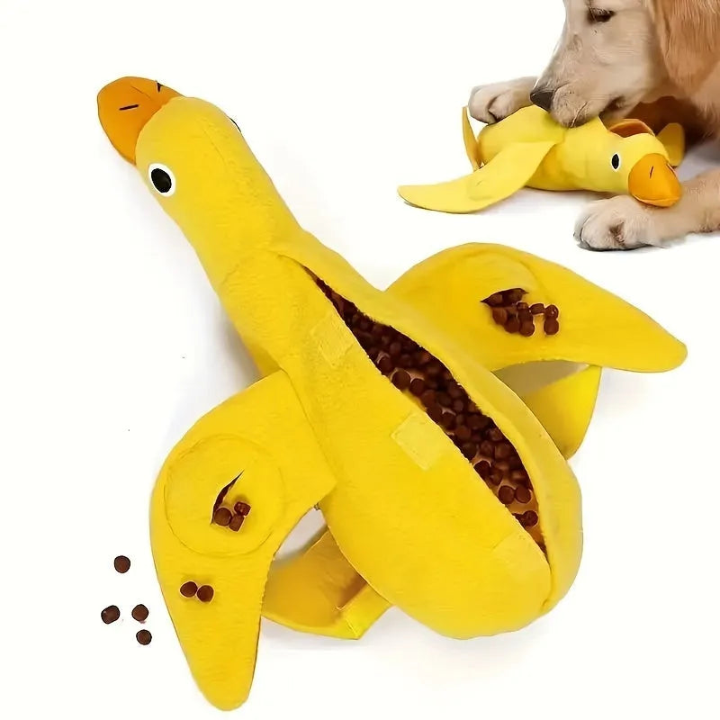 Yellow duck plush dog toy with squeaker and treat dispensing features