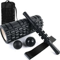 Black six-piece foam massage roller stick with gear design, 33cm long.