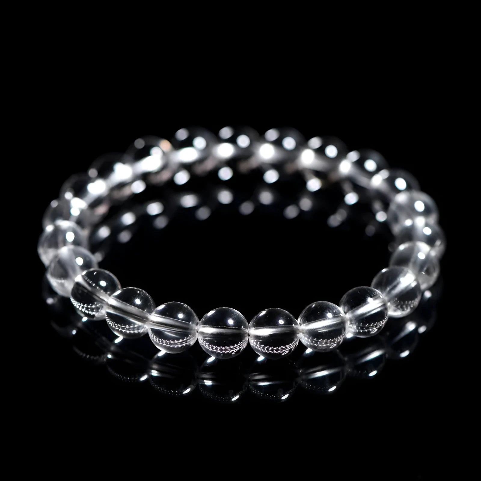 Natural Donghai white water crystal bead bracelet with geometric round beads on a wrist.