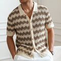 Short-sleeved yellow Tencel sweater with a textured hollow jacquard corrugated pattern, shown on a hanger.