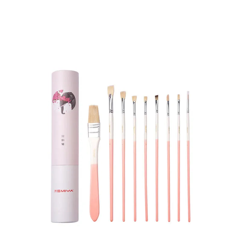 Acrylic gouache painting brush set with fan brushes, liner, and corner tools in animal designs on a table