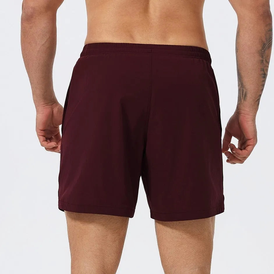 Men's moisture-wicking athletic shorts for basketball tennis running in nylon fabric