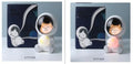 Resin bear-shaped starry sky night light with soft LED glow on a wooden table.